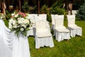 Wedding ceremony decorations . Flowers and chairs close up Royalty Free Stock Photo