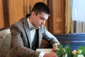 Wedding ceremony. Registry office. A newly-married couple signs the marriage document.Young couple signing wedding documents Royalty Free Stock Photo