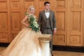 Wedding ceremony. Registry office. A newly-married couple signs the marriage document.Young couple signing wedding documents Royalty Free Stock Photo