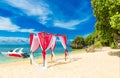 Wedding ceremony on a tropical beach in red. Arch decorated with flowers Royalty Free Stock Photo