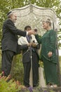 Wedding ceremony under a canopy with Rabbi, bride and groom at a traditional Jewish wedding in Ojai, CA