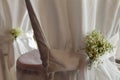 Wedding chair with Baby`s-breath flowers