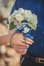 Wedding close picture of bride bouquet of flowers roses hold by couple husband and wife Romantic scene of young family love betwee Royalty Free Stock Photo