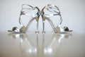 Wedding concept with silver shoes. High heels wedding shoes. Royalty Free Stock Photo