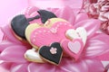 Wedding cookies on pink bridal table - closeup.