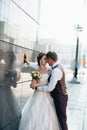 Wedding couple on backround mirror buildings Royalty Free Stock Photo