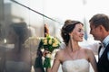 Wedding couple on backround mirror buildings Royalty Free Stock Photo