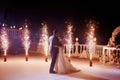 Wedding couple dancing in sparklers their first dance Royalty Free Stock Photo