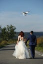 Wedding couple and drone