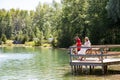 Wedding couple fishing on dock