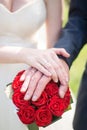 Wedding couple.hands and rings on bride`s bouquet. declaration of love. Wedding background, day details Royalty Free Stock Photo