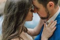 Wedding couple is hugging near the mountain river. Close-up portrait. Groom and bride . Nature wedding photoshoot. Photo session