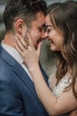 Wedding couple is hugging near the mountain river. Close-up portrait. Groom and bride . Nature wedding photoshoot. Photo session