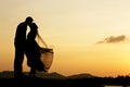 Wedding couple kissing with sunset Royalty Free Stock Photo