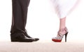 Wedding couple. Legs of the groom and the bride. Royalty Free Stock Photo