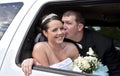 Wedding couple in Limousine Royalty Free Stock Photo