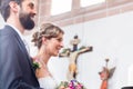 Wedding couple marrying in church