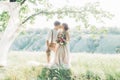 Wedding couple on nature. bride and groom hugging at wedding.