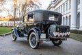 Wedding Couple in old antique Oldtimer Car 1928 during a Wedding Decorated Royalty Free Stock Photo