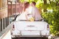 Wedding couple with old car Royalty Free Stock Photo