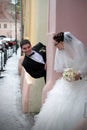 Wedding couple playing hide and seek