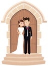 Wedding couple posing at church door Royalty Free Stock Photo