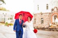 Wedding couple in the rain Royalty Free Stock Photo