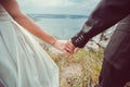 Romantic young couple enjoying sun near river