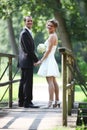 Wedding couple standing in bridge Royalty Free Stock Photo