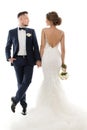 Wedding Couple Studio Portrait, Elegant Groom in Suit Beautiful Bride in White Dress Back Side Royalty Free Stock Photo