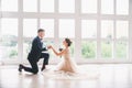 Wedding couple on the studio. Wedding day. Happy young bride and groom on their wedding day. Wedding couple - new family. Royalty Free Stock Photo