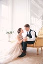 Wedding couple on the studio. Wedding day. Happy young bride and groom on their wedding day. Wedding couple - new family. Royalty Free Stock Photo