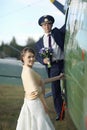 Wedding couple in vintage aircraft Royalty Free Stock Photo