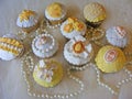 Wedding cupcakeswith fondant angels, roses, camea, flowers and jewellery beads