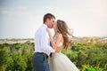 Wedding Day. Beautiful Bride in White Dress with Groom. Happy Kissing Couple Royalty Free Stock Photo