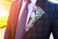 Wedding day. Beautiful creative groom boutonniere on the suit of Royalty Free Stock Photo