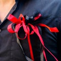 Wedding day. Beautiful creative groom boutonniere on the suit of Royalty Free Stock Photo