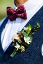 Wedding day. Beautiful creative groom boutonniere on the suit of Royalty Free Stock Photo