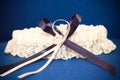 Wedding decor of blue garter with ribbon of lace Royalty Free Stock Photo