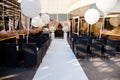 Wedding decor. Chairs for guests, wedding rings and huge white balloons Royalty Free Stock Photo