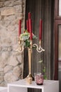 Wedding decorated candlestick with the vinous candles