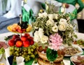 Wedding decorated table with flowers and fruit Royalty Free Stock Photo
