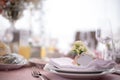 Wedding decorated table. Luxury light decor on table in restaurant