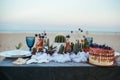 Wedding decorated table with succulents on the sand Royalty Free Stock Photo