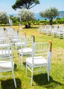 Wedding decoration chairs in rustic green style. Wedding ceremony outdoors Royalty Free Stock Photo