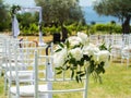 Wedding decoration chairs in rustic green style. Wedding ceremony outdoors Royalty Free Stock Photo
