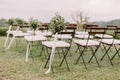 Wedding decoration chairs in rustic green style Royalty Free Stock Photo