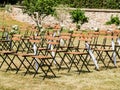 Wedding decoration chairs in rustic green style. Wedding ceremony outdoors Royalty Free Stock Photo