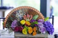 Wedding decoration with flowers and hand fan