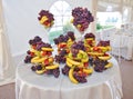 Wedding decoration with fruits, bananas, grapes and apples Royalty Free Stock Photo